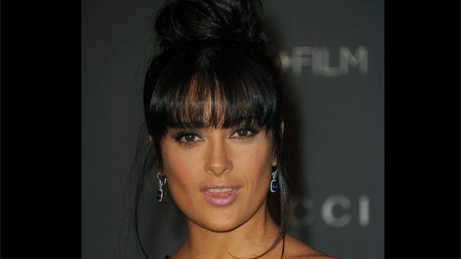 Hayek Dazzles in $1M Earrings.jpg
